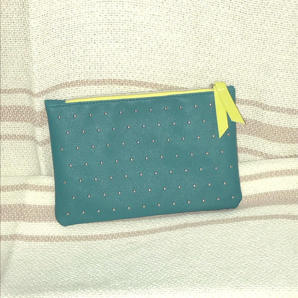 Teal makeup bag with studs